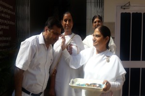 Tilak to Dr. Subhash (ENT, Surgeon from Holy Hospital Barnala) by BK Brij Didi (Centre Incharge Barnala)